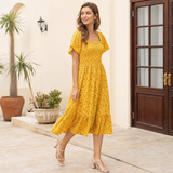 Vestido midi floral amarillo Carlota Maré - segunda pose