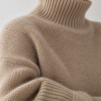 Primer plano del punto suave y el cuello acanalado del jersey camel