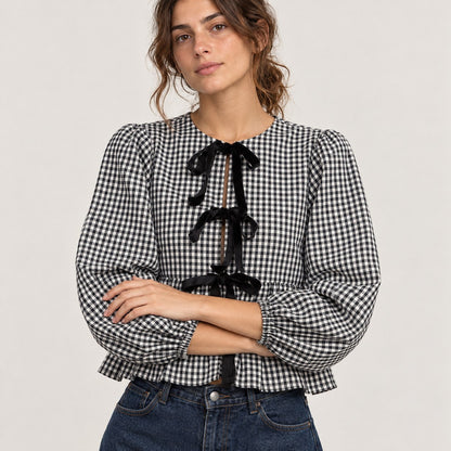 Blusa negra de cuadros vichy con lazos y manga farol