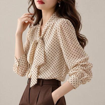 Blusa albaricoque de lunares con lazada y manga larga